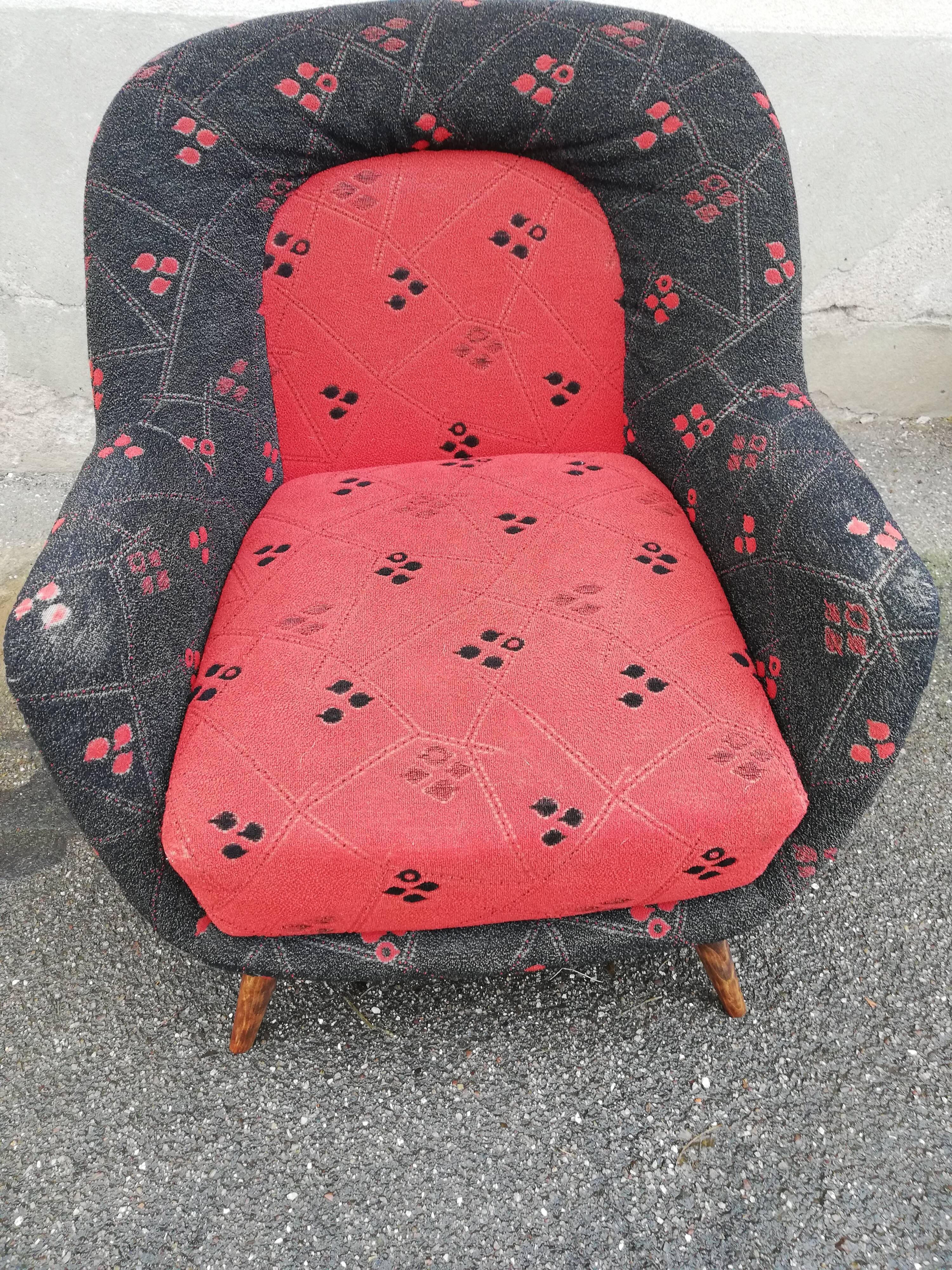 Fauteuil année 50 rouge et noir pieds compas