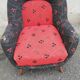 Fauteuil année 50 rouge et noir pieds compas