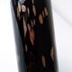 Black opaque glass vase with minimalist style copper inlays