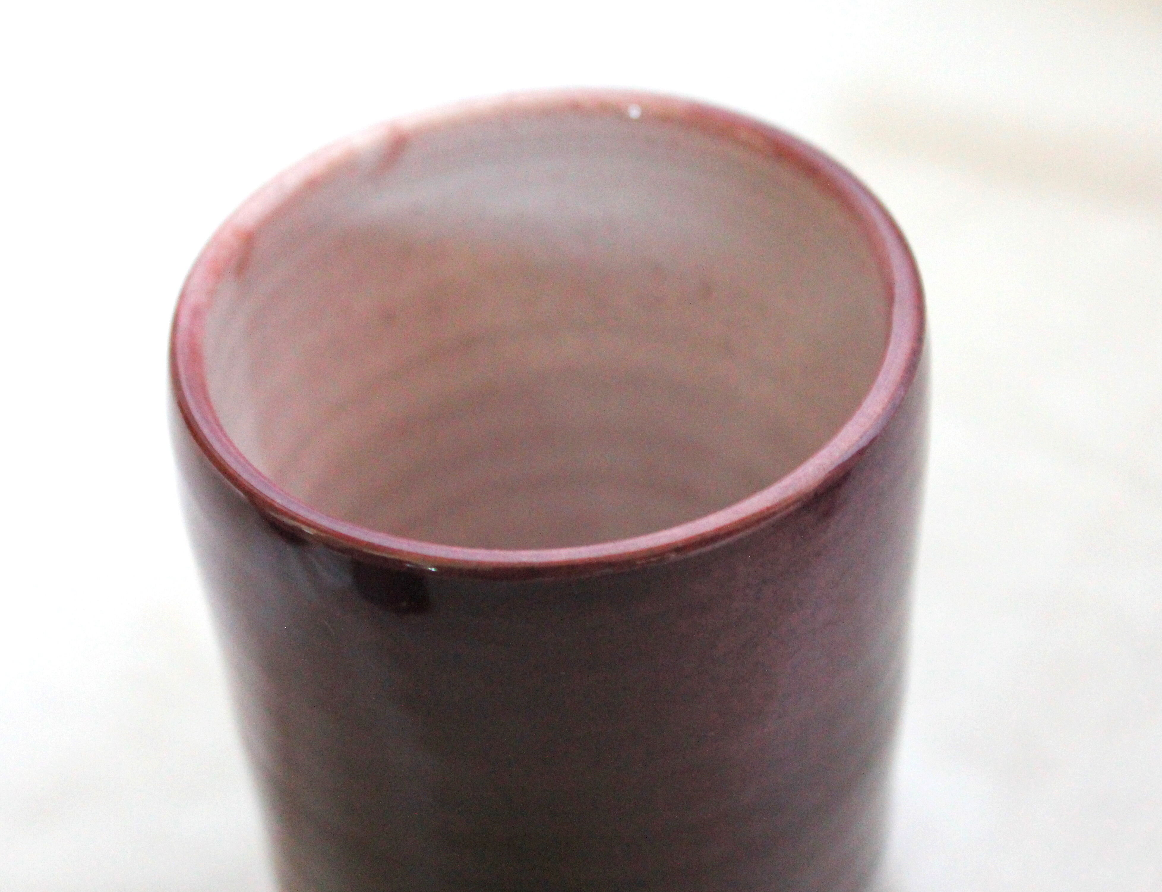 Purple ceramic pitcher and glasses set