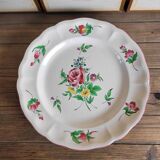 Large round dish KG Lunéville Reverbère, earthenware from the East, floral decoration.