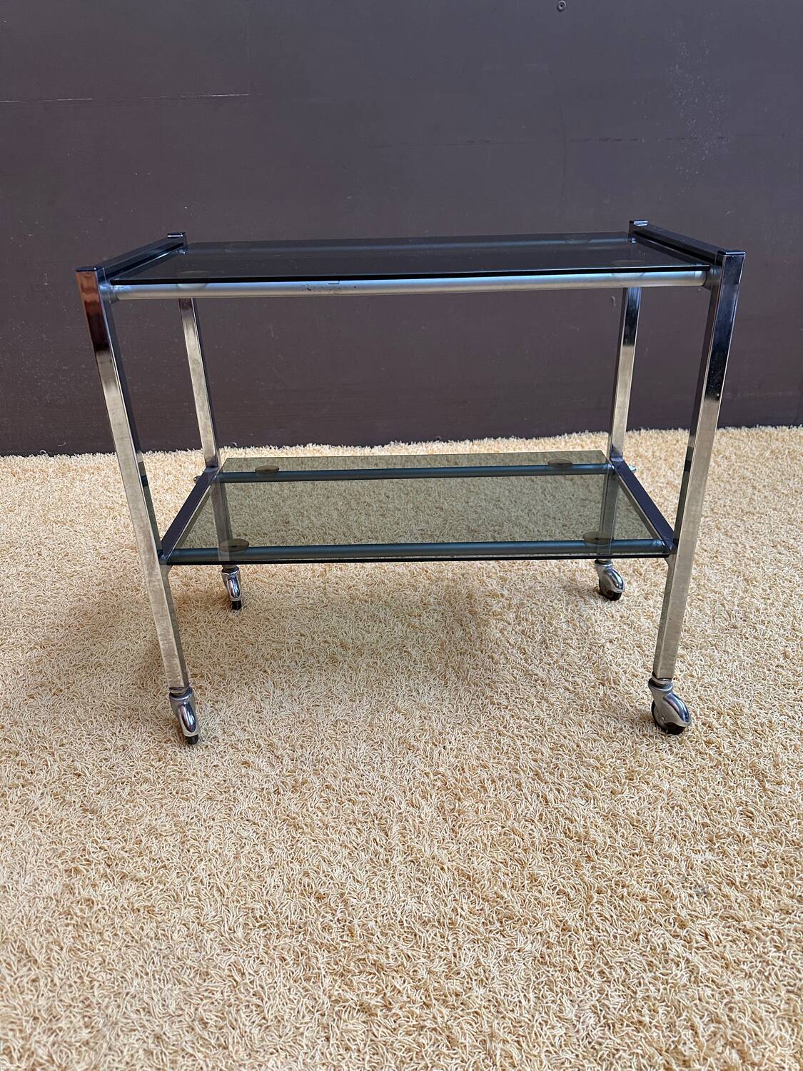 Metal and smoked glass dessert table