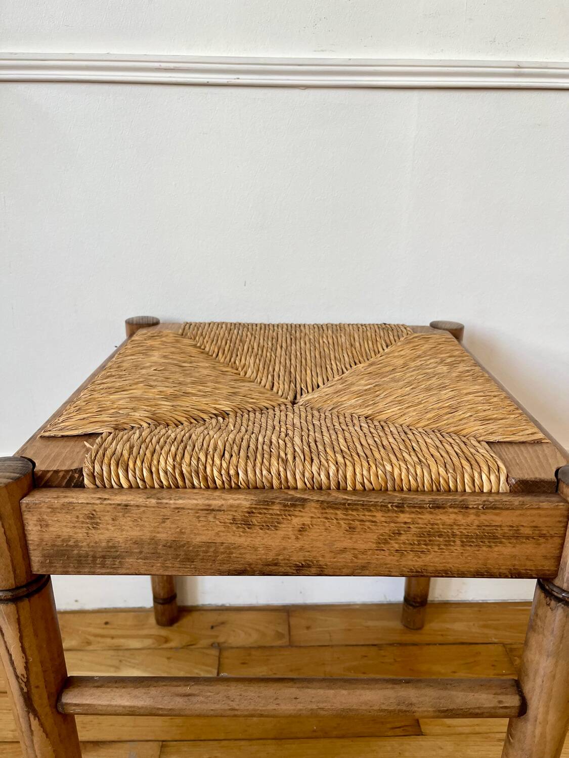 Straw and old wood stool