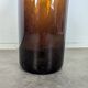Large antique blown amber glass bottle