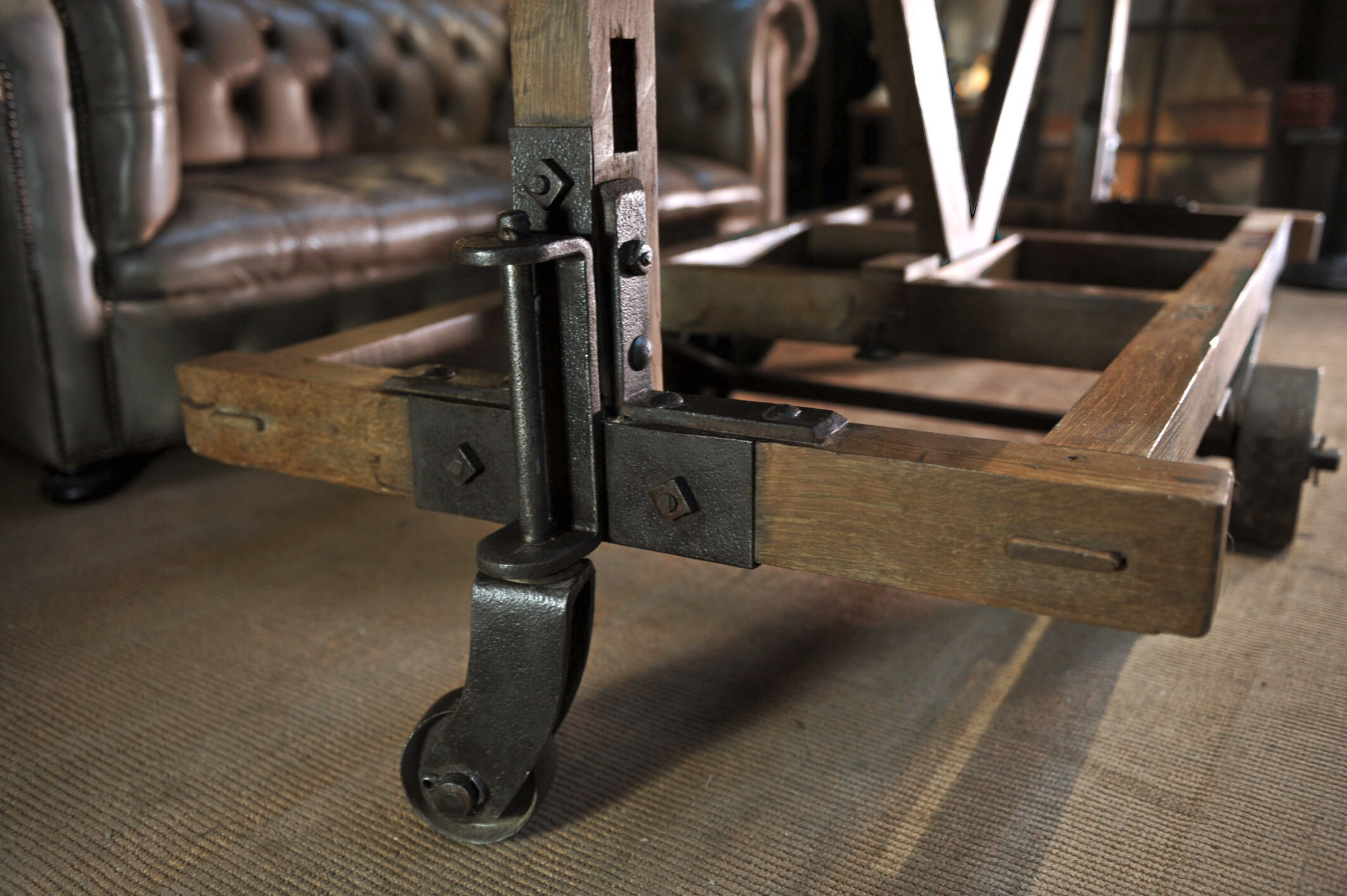 Former wooden factory shelf on metal wheels 1900