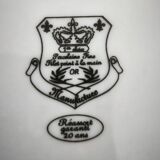 12 deep plates in porcelain with double gold trim.