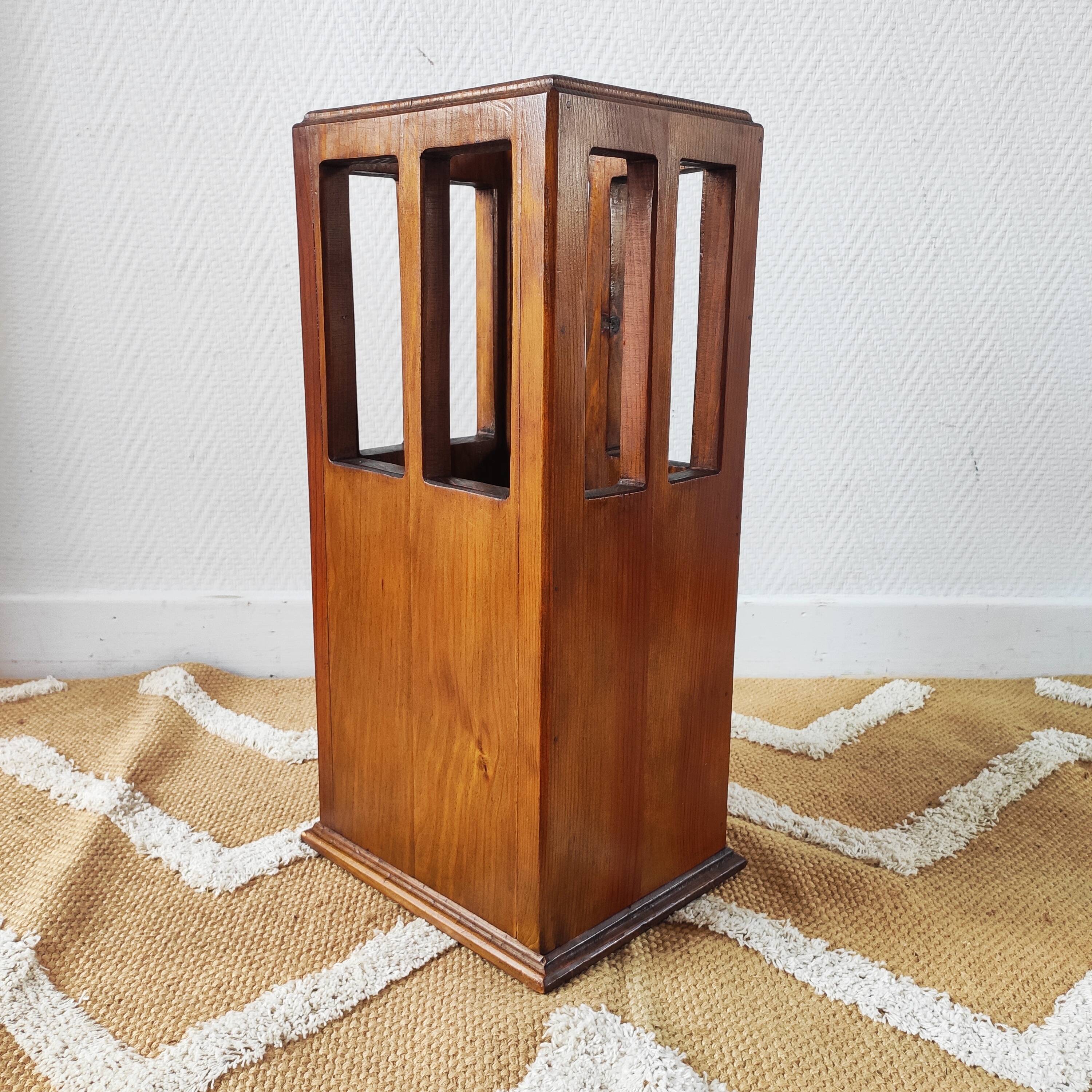 Vintage brutalist umbrella stand made of solid wood.