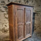 Antique French wardrobe in oak and pine, late 19th century.