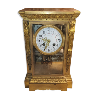Cage pendulum with its double mercury bulb pendulum.