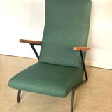 Lounge or easy chair with armrests
