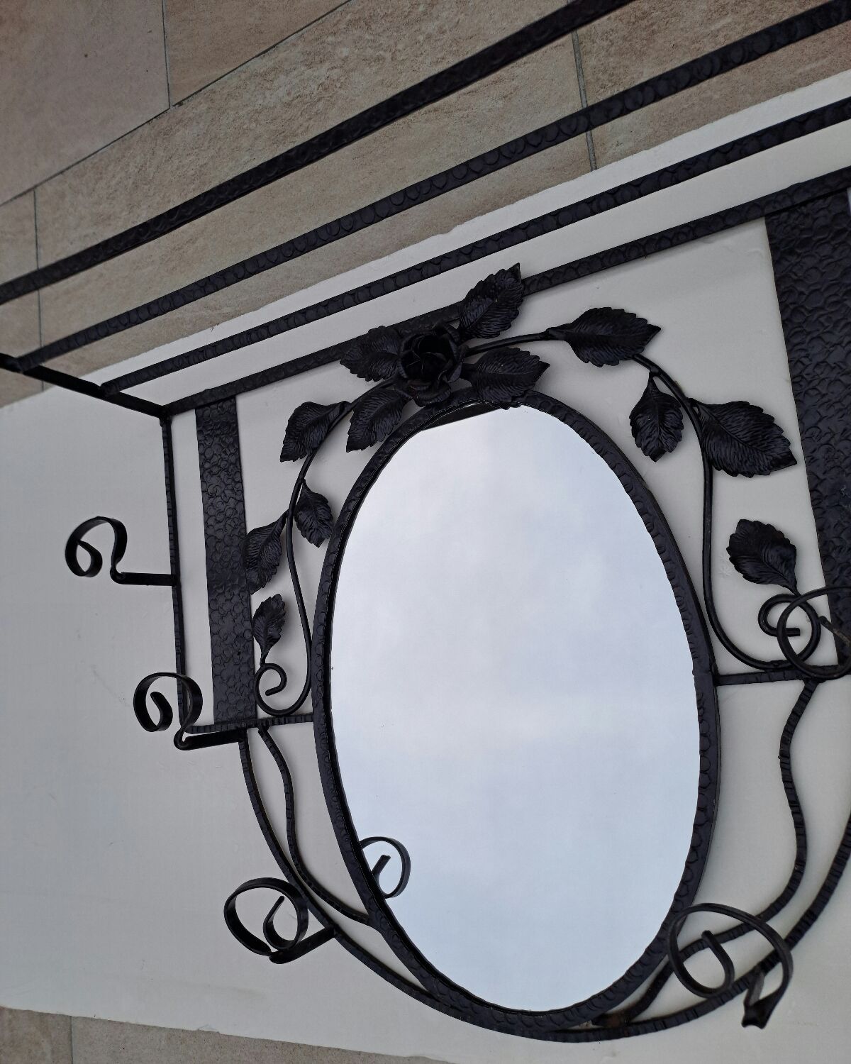 Wrought iron wall coat rack