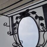 Wrought iron wall coat rack