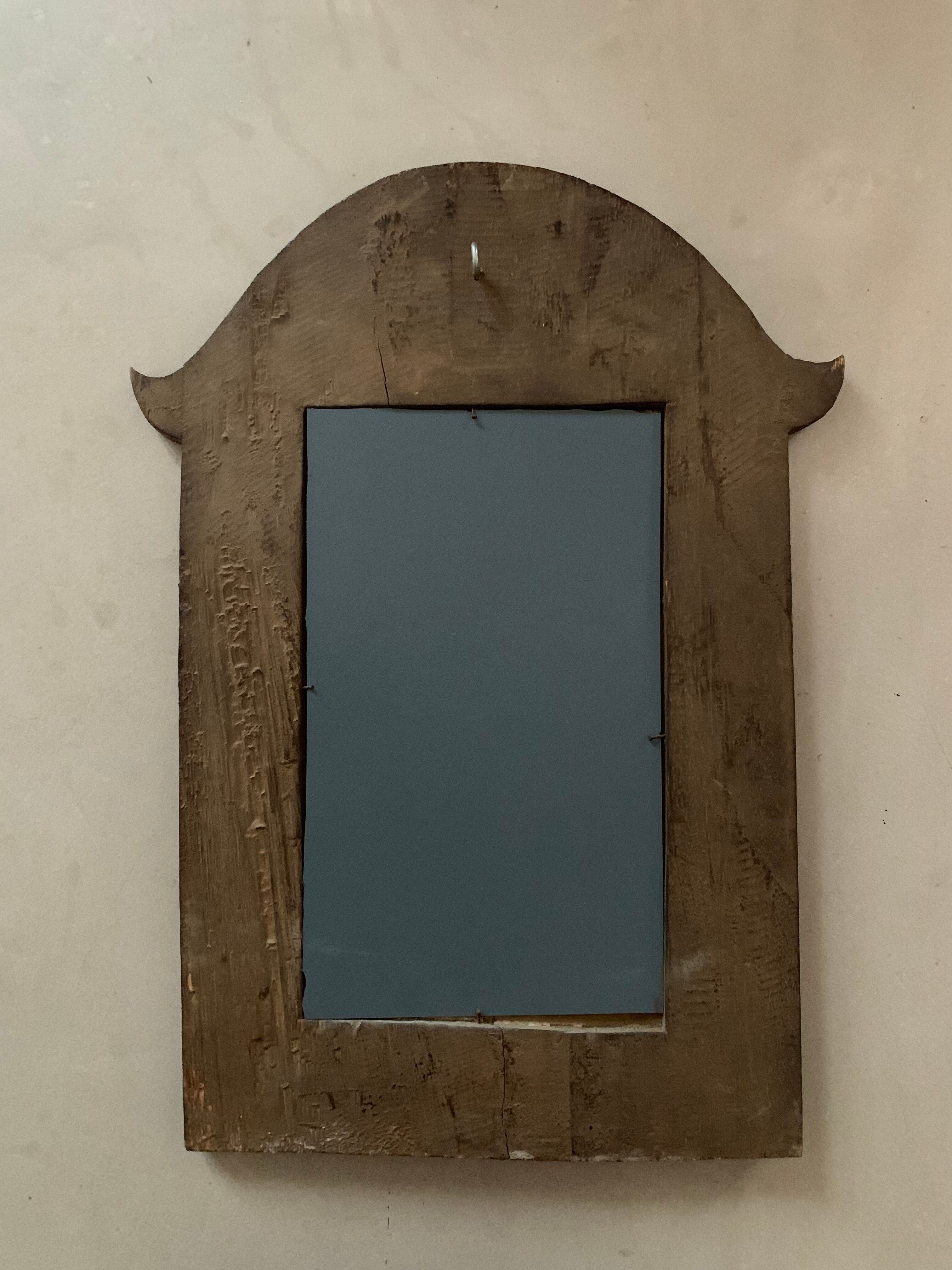 Antique carved wooden mirror
