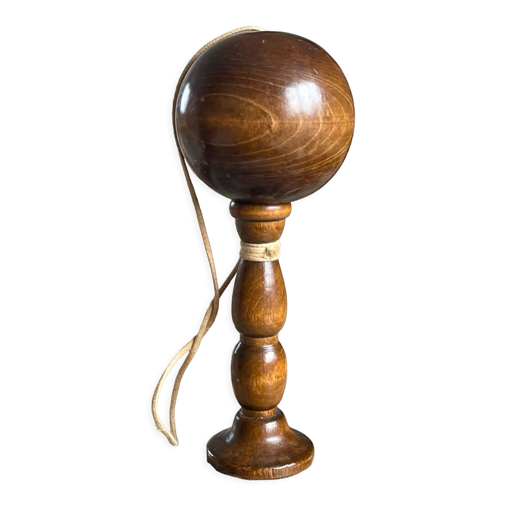 Old bilboquet in turned wood