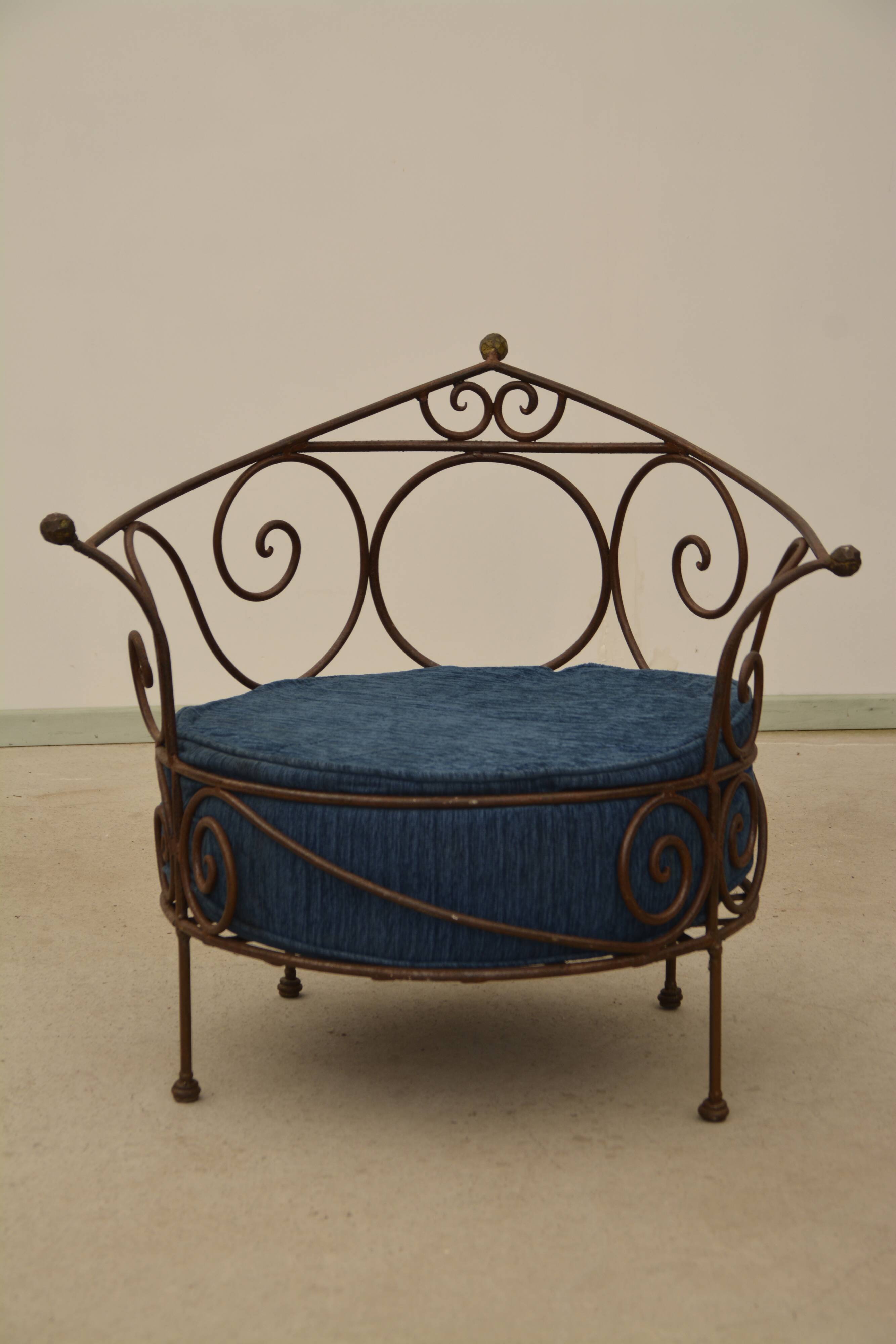 Wrought iron armchairs
