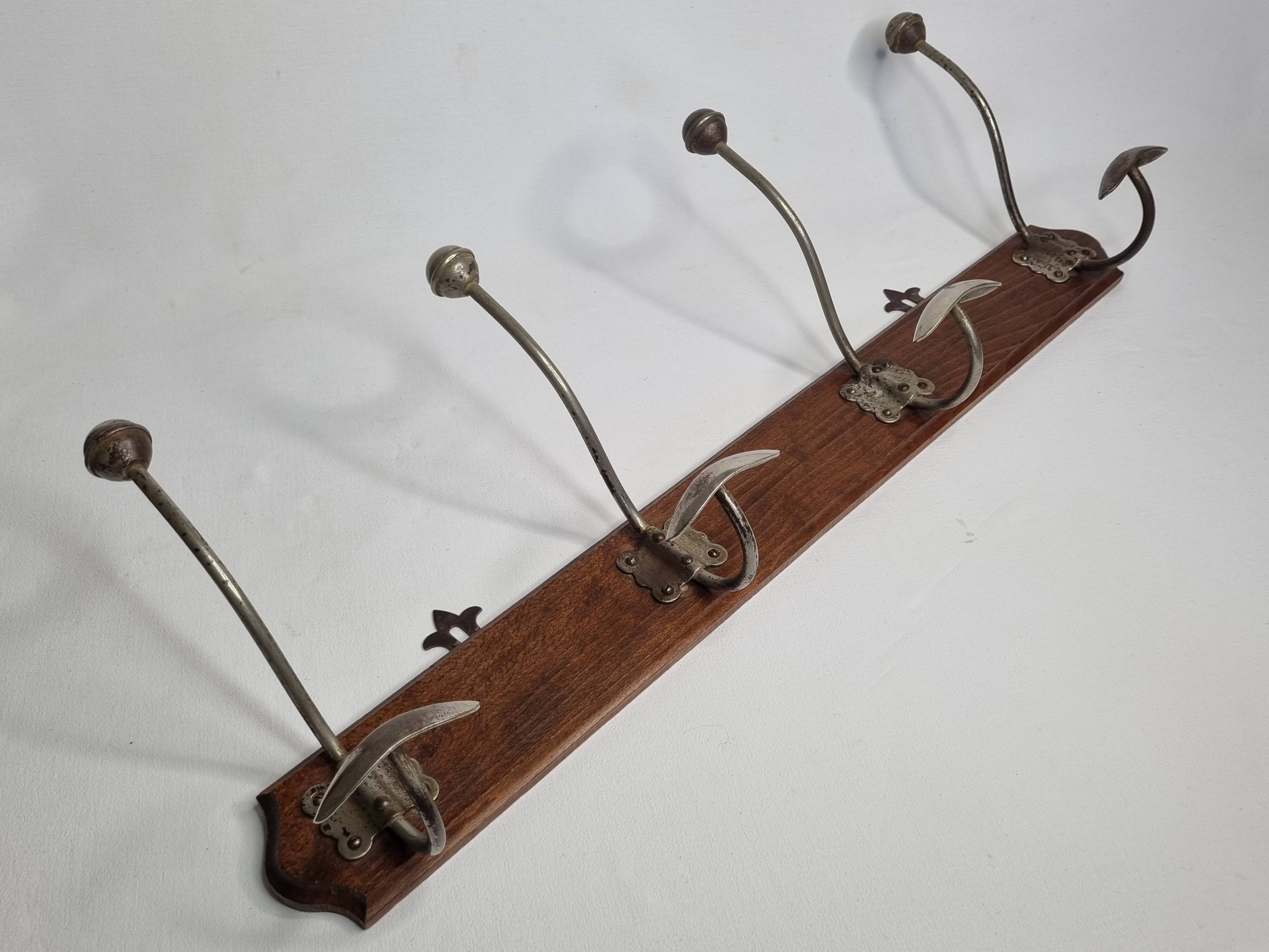 Antique wall-mounted coat rack in wood and metal with 4 hooks, 66 cm