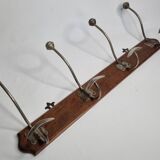 Antique wall-mounted coat rack in wood and metal with 4 hooks, 66 cm