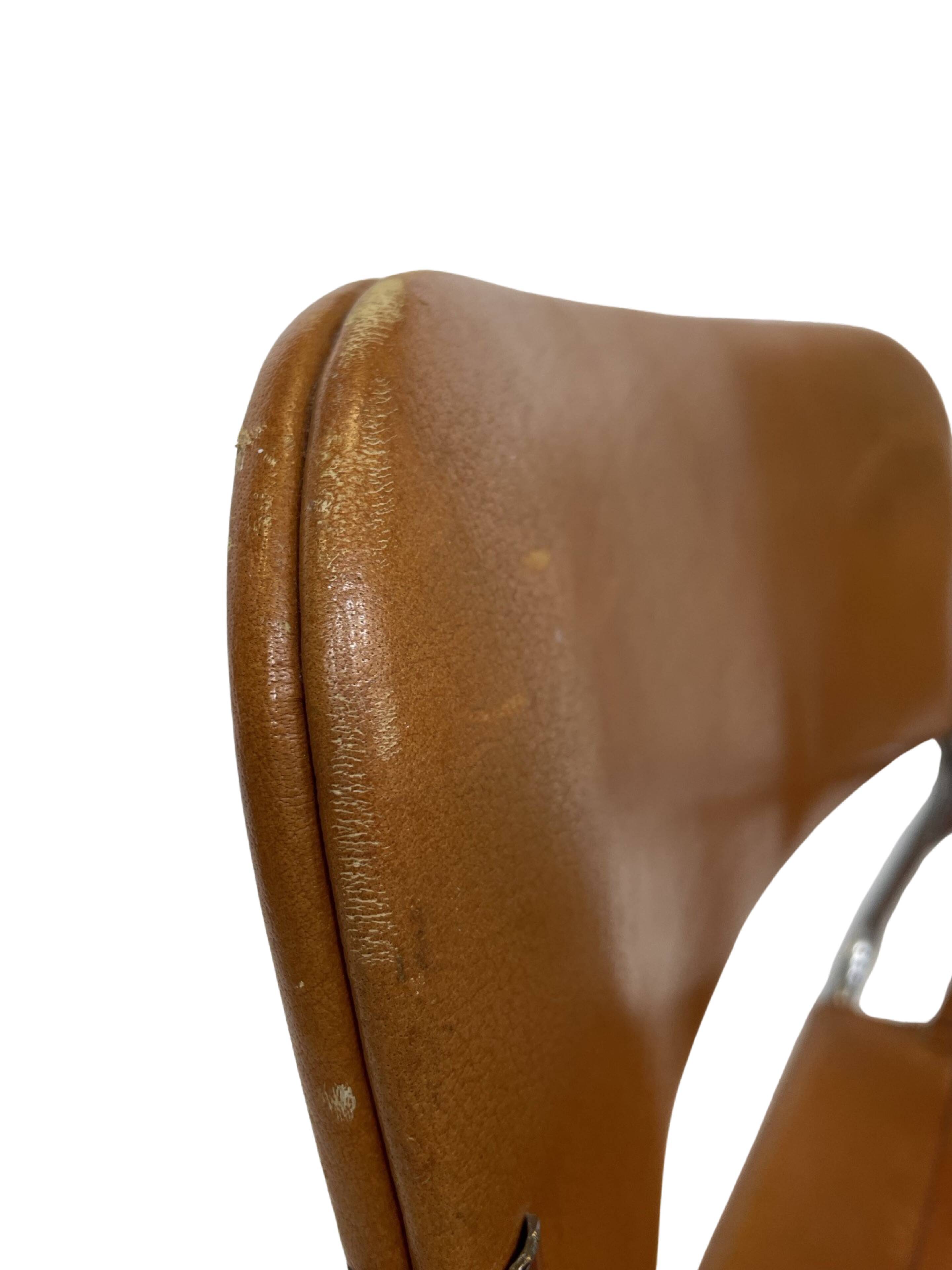 vintage dining room chair in cognac leather and chrome 1970s Italy