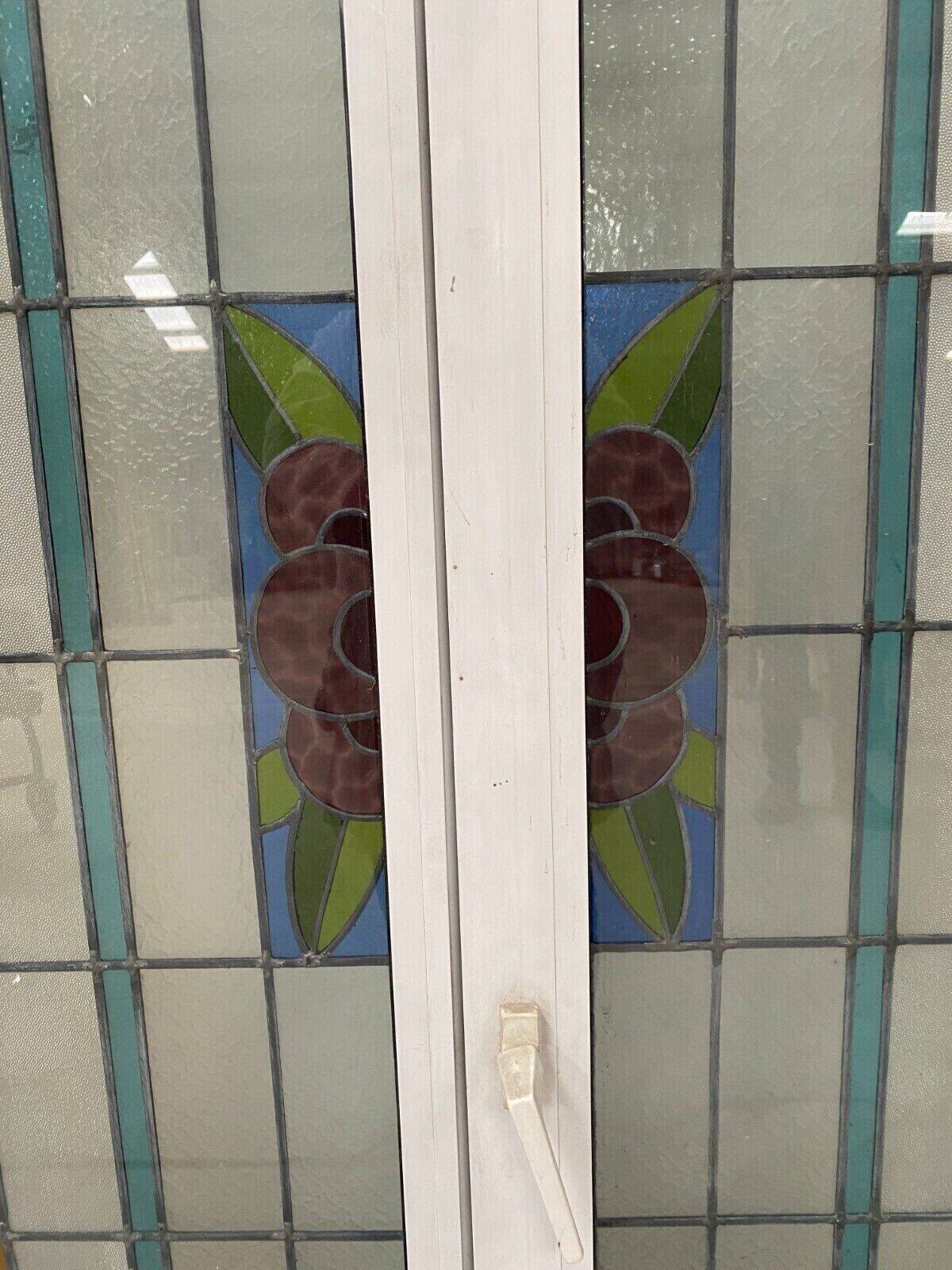 Pair of two-leaf windows in 20th century Art Deco stained glass