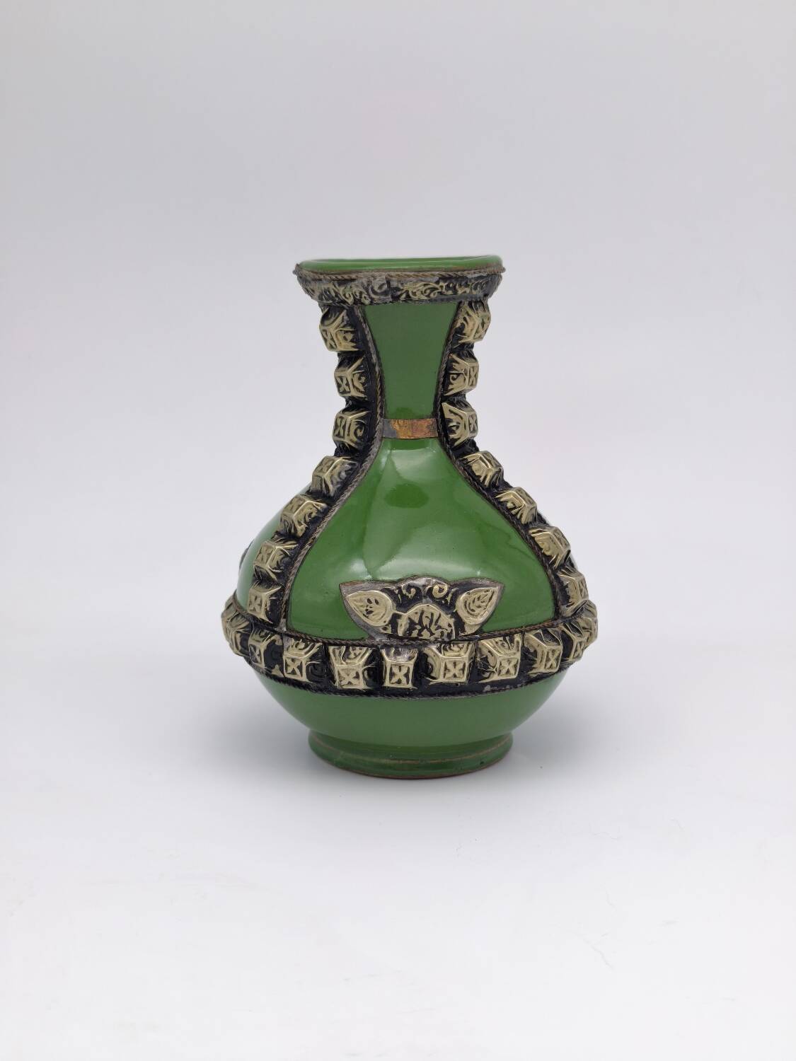 Antique green glazed ceramic vase with relief decoration – Europe