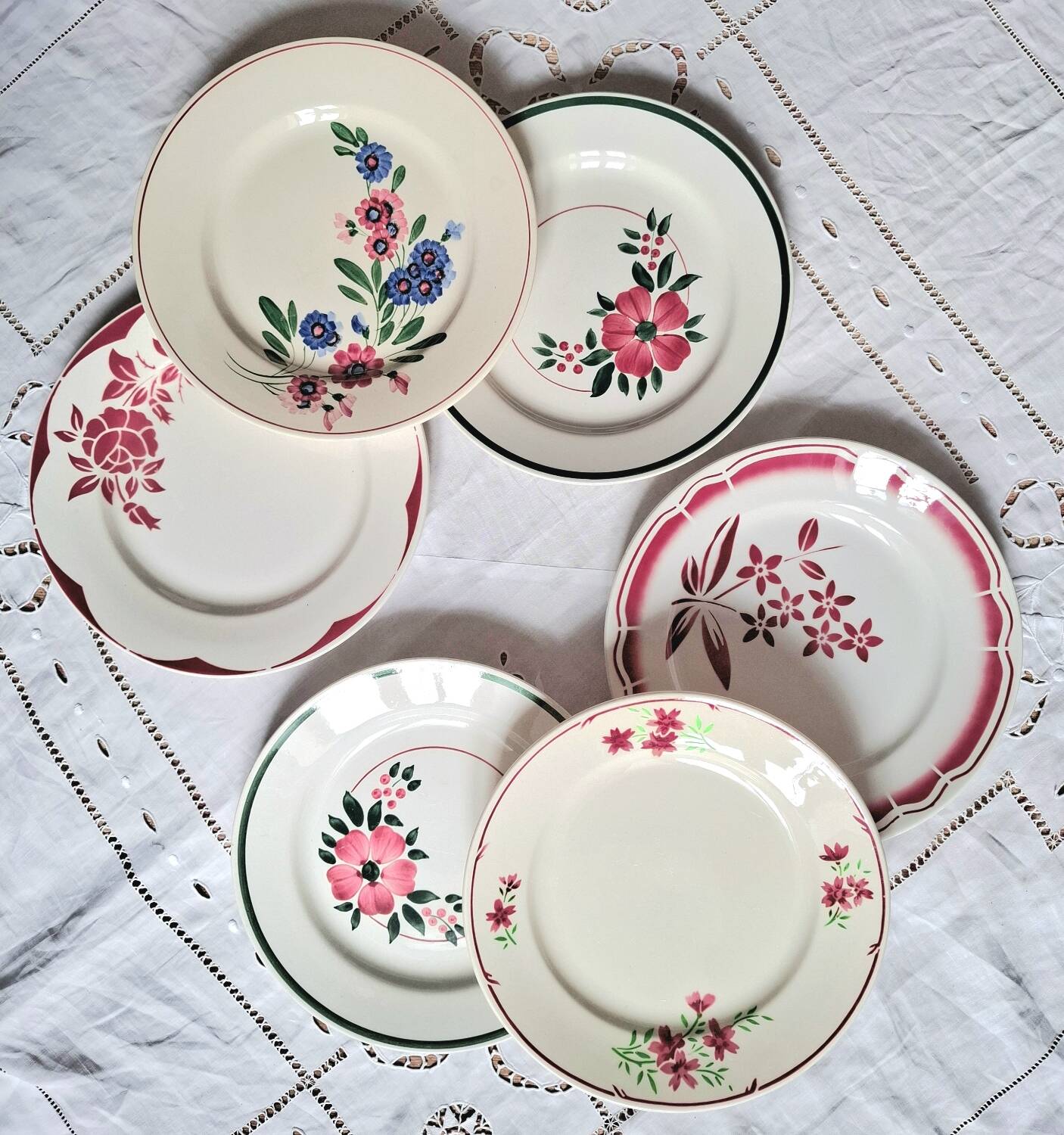Old mismatched earthenware dinner plates
