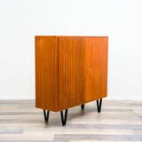 Highboard in teak wood with grooved doors,