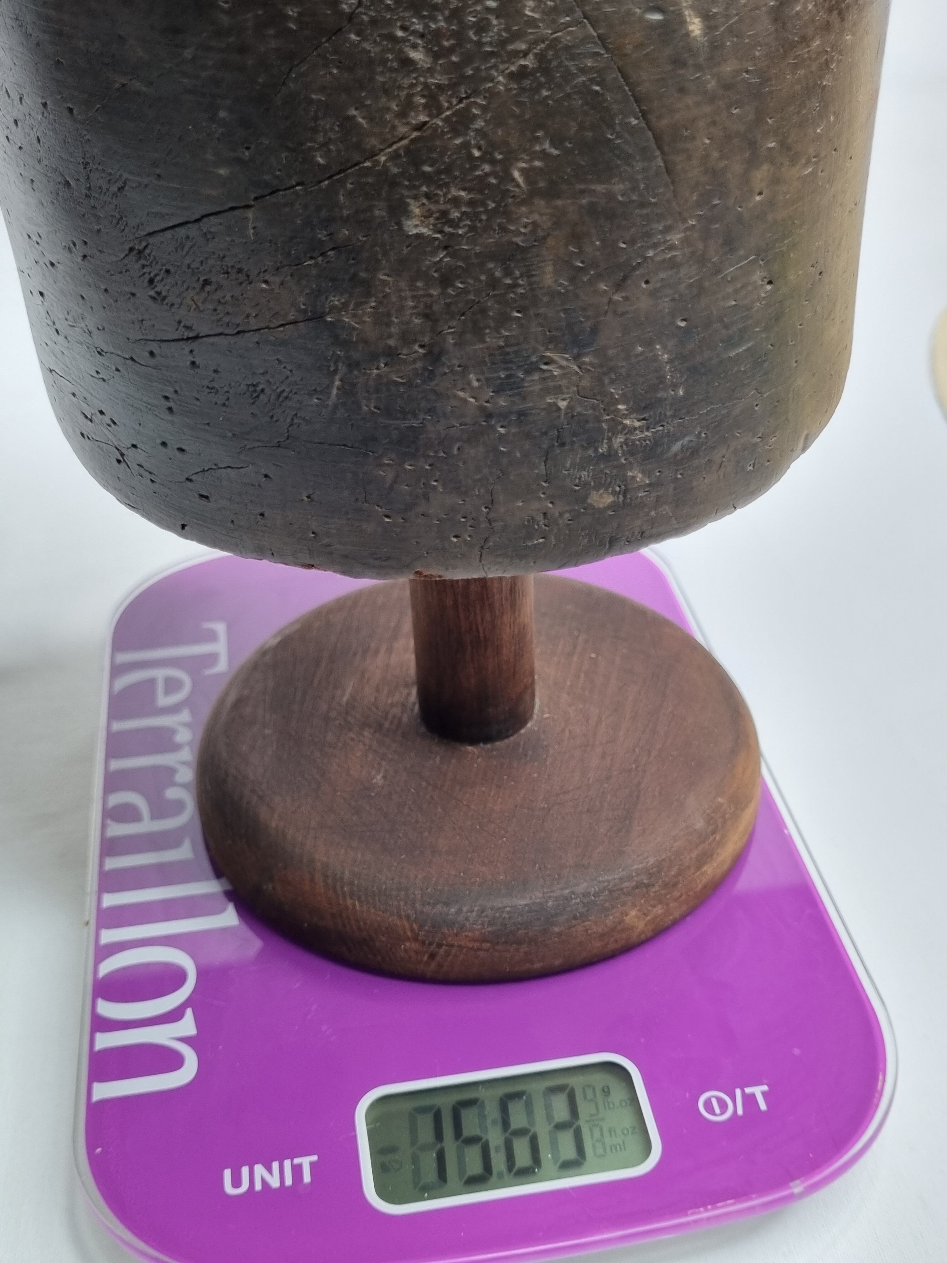 Old solid wood hat shape on foot, 1900