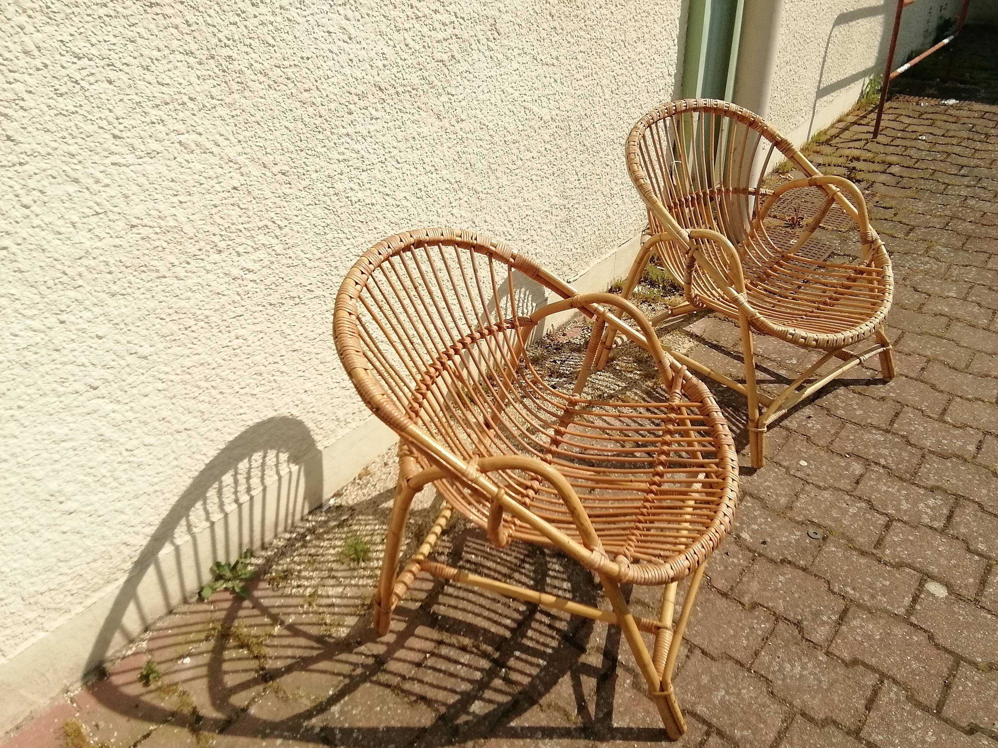 Vintage rattan armchair pair