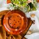 Vintage glazed terracotta strainer