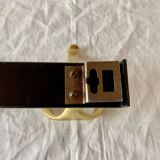 Vintage coat rack in lacquered metal with three golden aluminum hooks