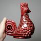 Pair of ceramic glazed candlesticks in the shape of roosters, signed A.G Roger, year 1948.
