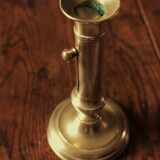 Brass pusher torch candle holder