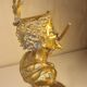 An antique bronze cigar lighter.