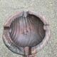 Round candle holder in turned carved wood