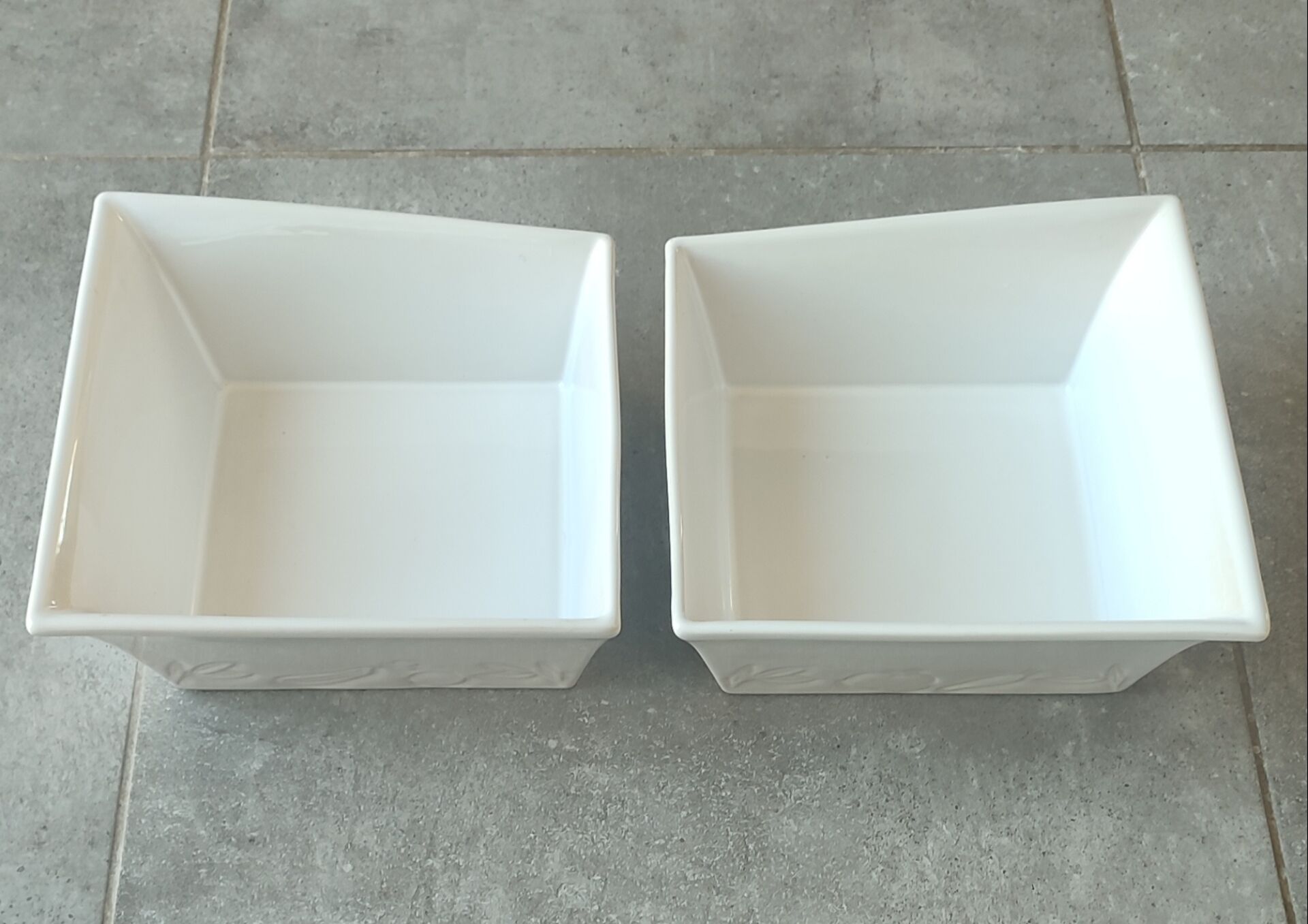 Two asymmetrical square gratin dishes BCI numbered, Made in France