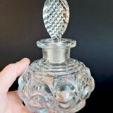 Old perfume bottle in molded