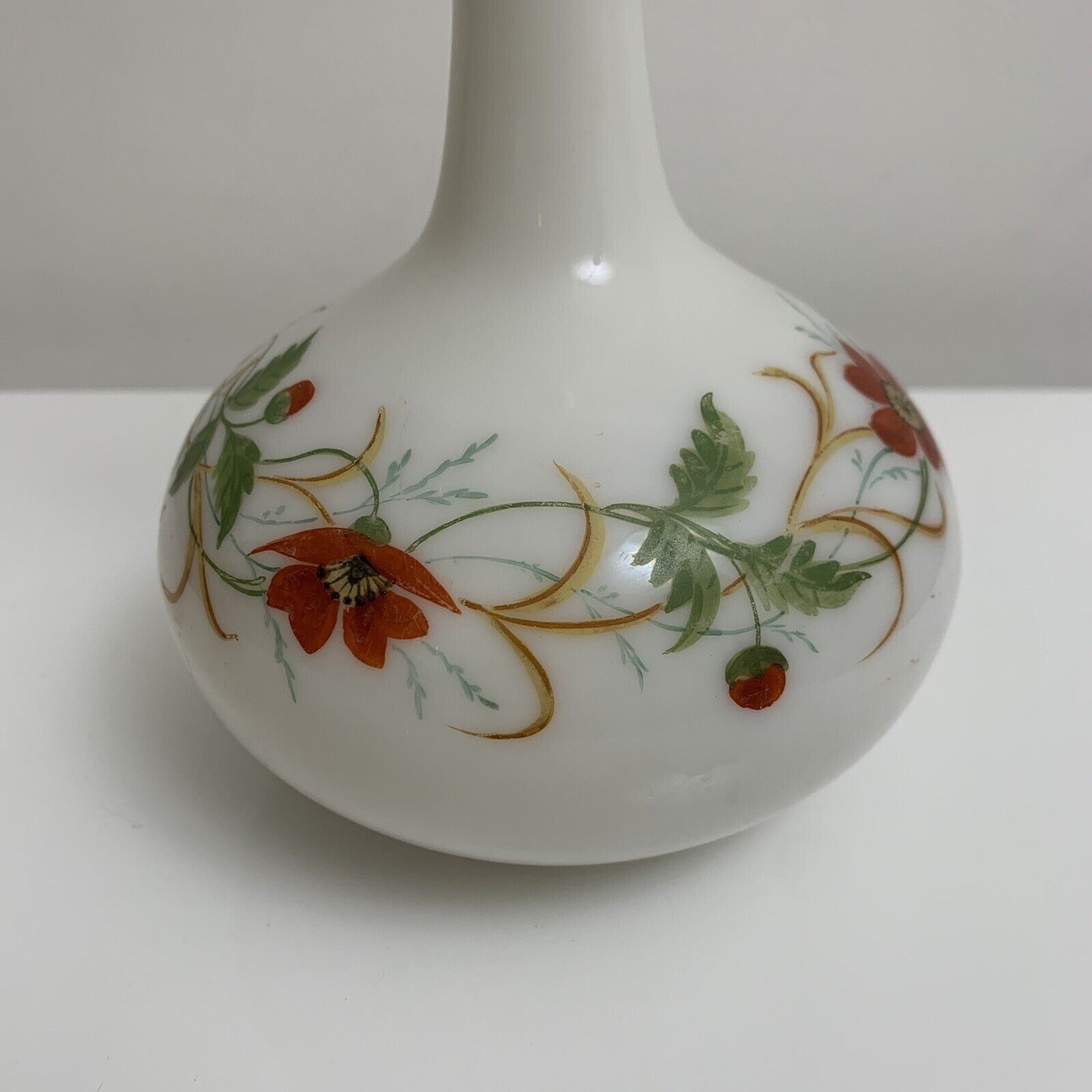 Old vase in opaline floral decoration painted