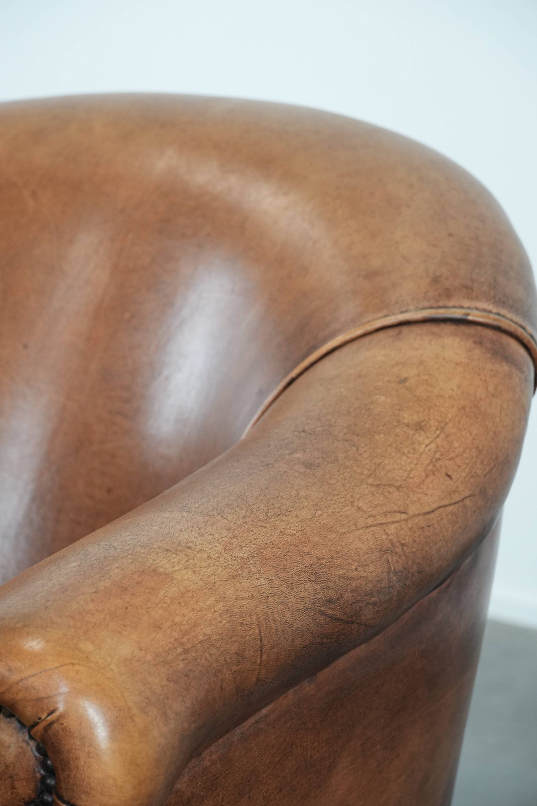 Sheepskin leather club chair with beautiful colours and comfortable seat