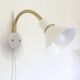 Pair of Scandinavian wall sconces, white and gold metal.