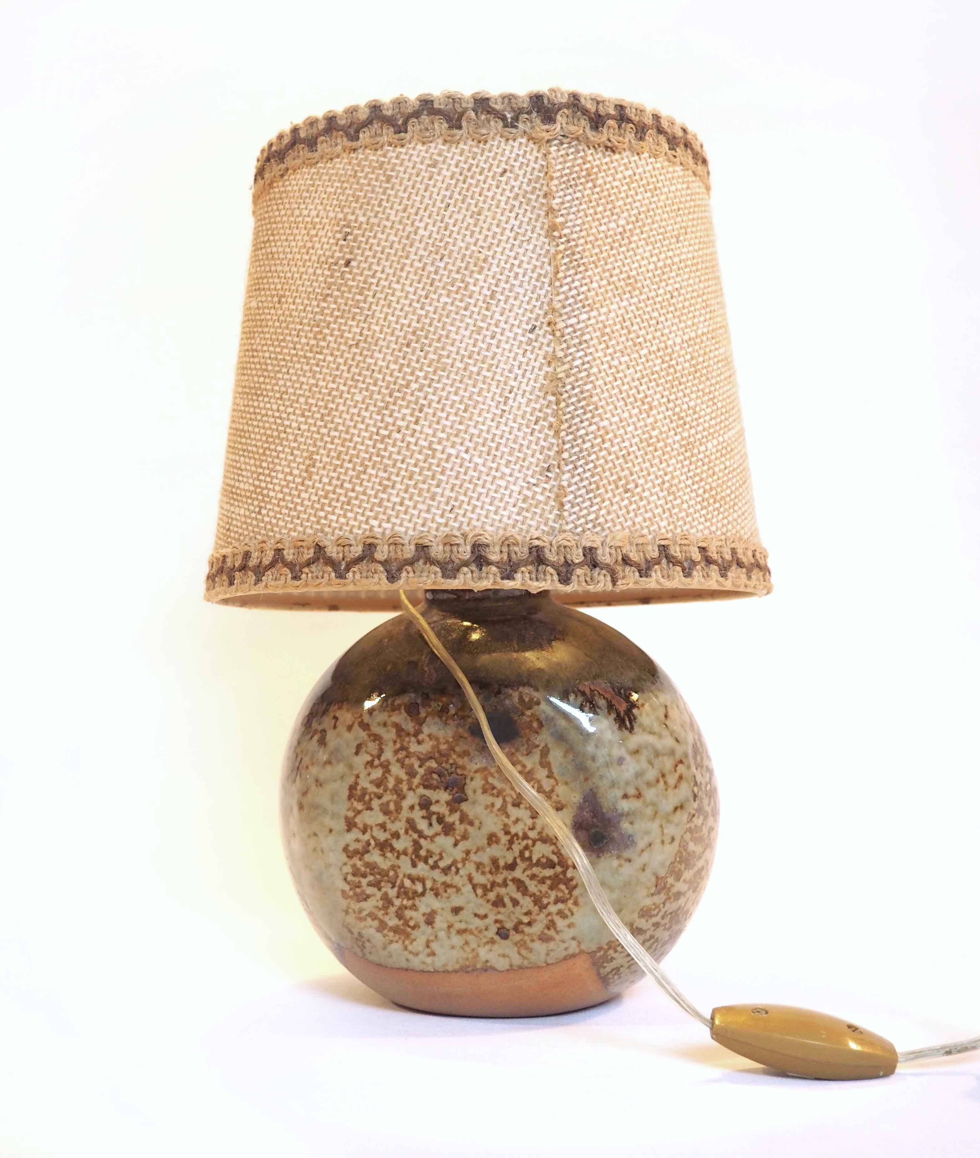 Flattened ball ceramic lamp