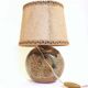Flattened ball ceramic lamp