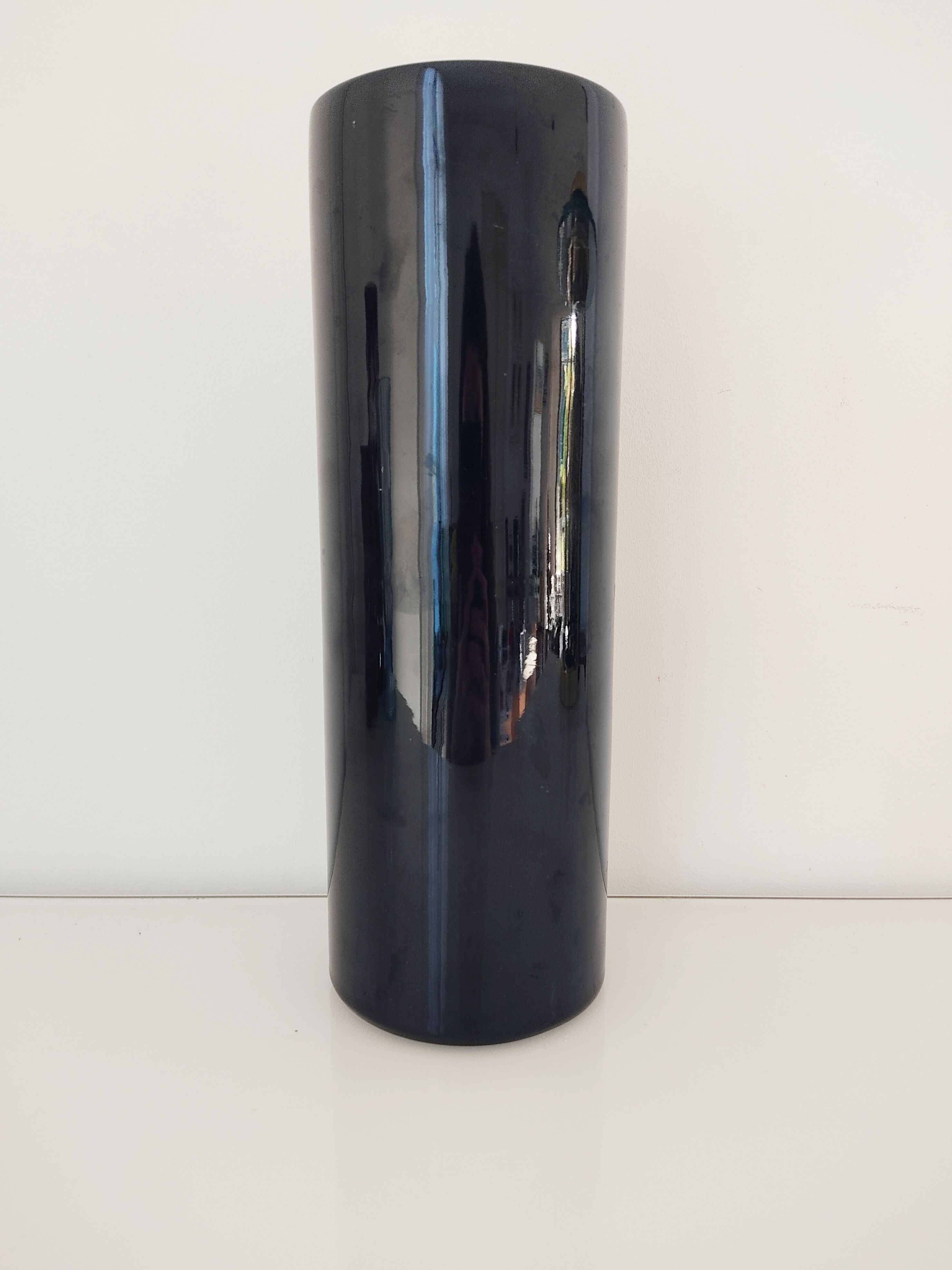Dark blue ceramic roller vase