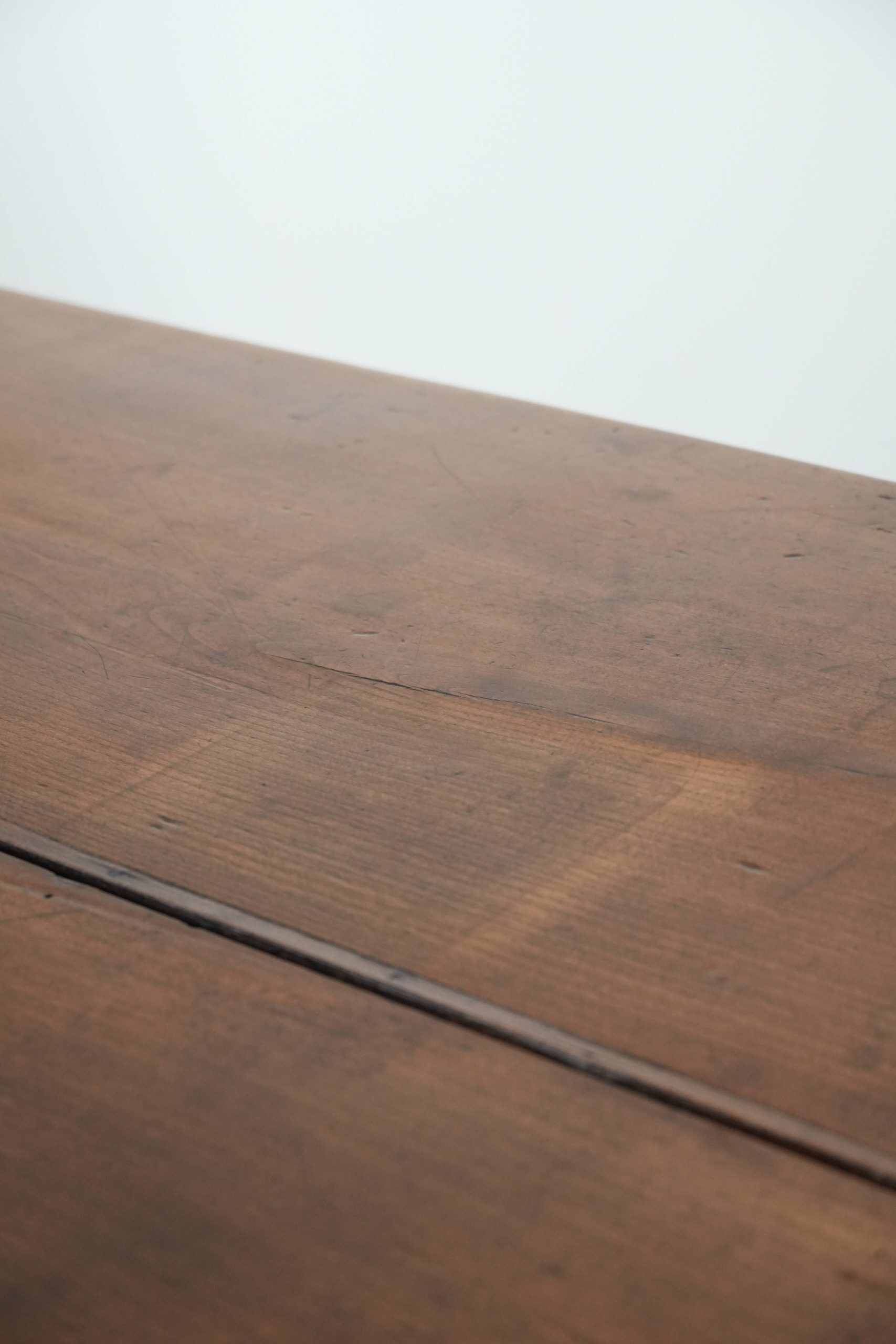 Elegant and subtle antique French dining table made of fruitwood