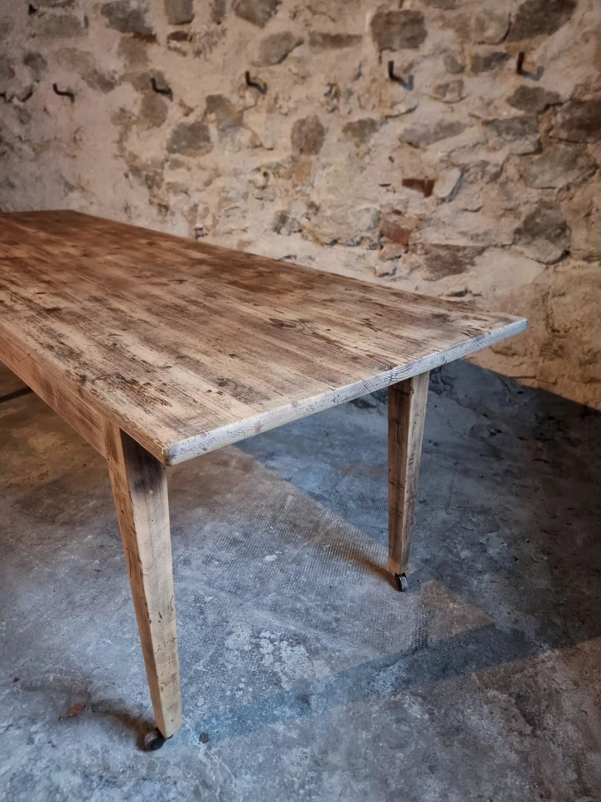 Antique French pine dining table, large farmhouse table on wheels, 19th century.