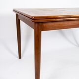 Dining table in teak with extensions of danish design from the 1960s