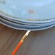 A lot of old white and gold porcelain plates T de F.