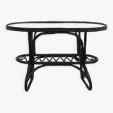 Black rattan and glass coffee table