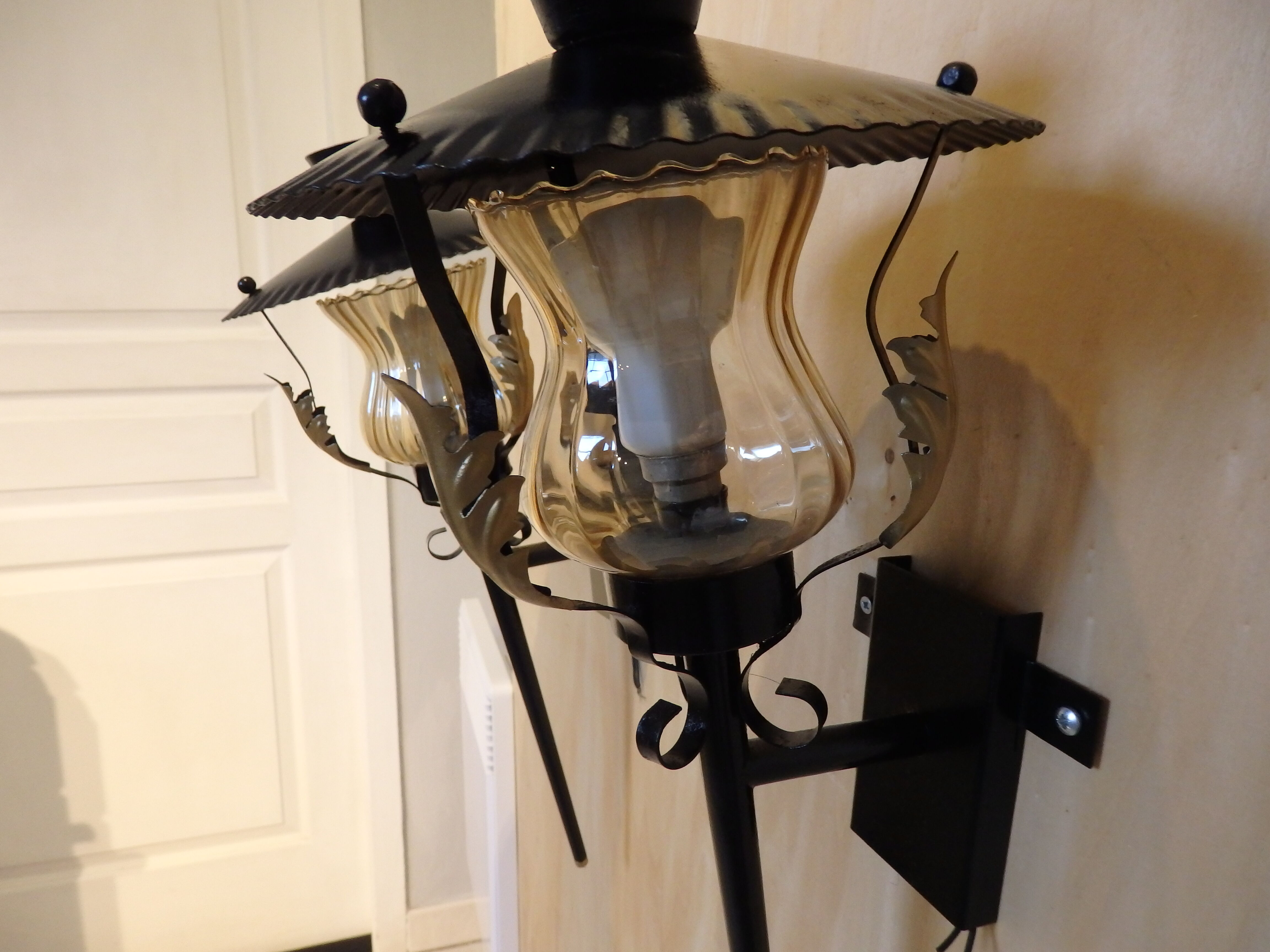 Pair of vintage torch wall lamps