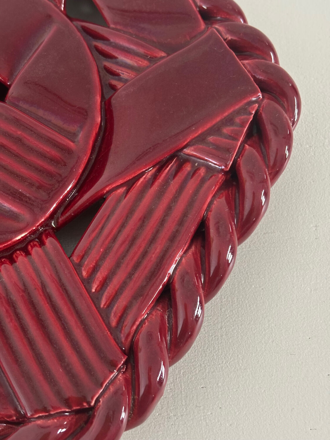 Woven ceramic trivet