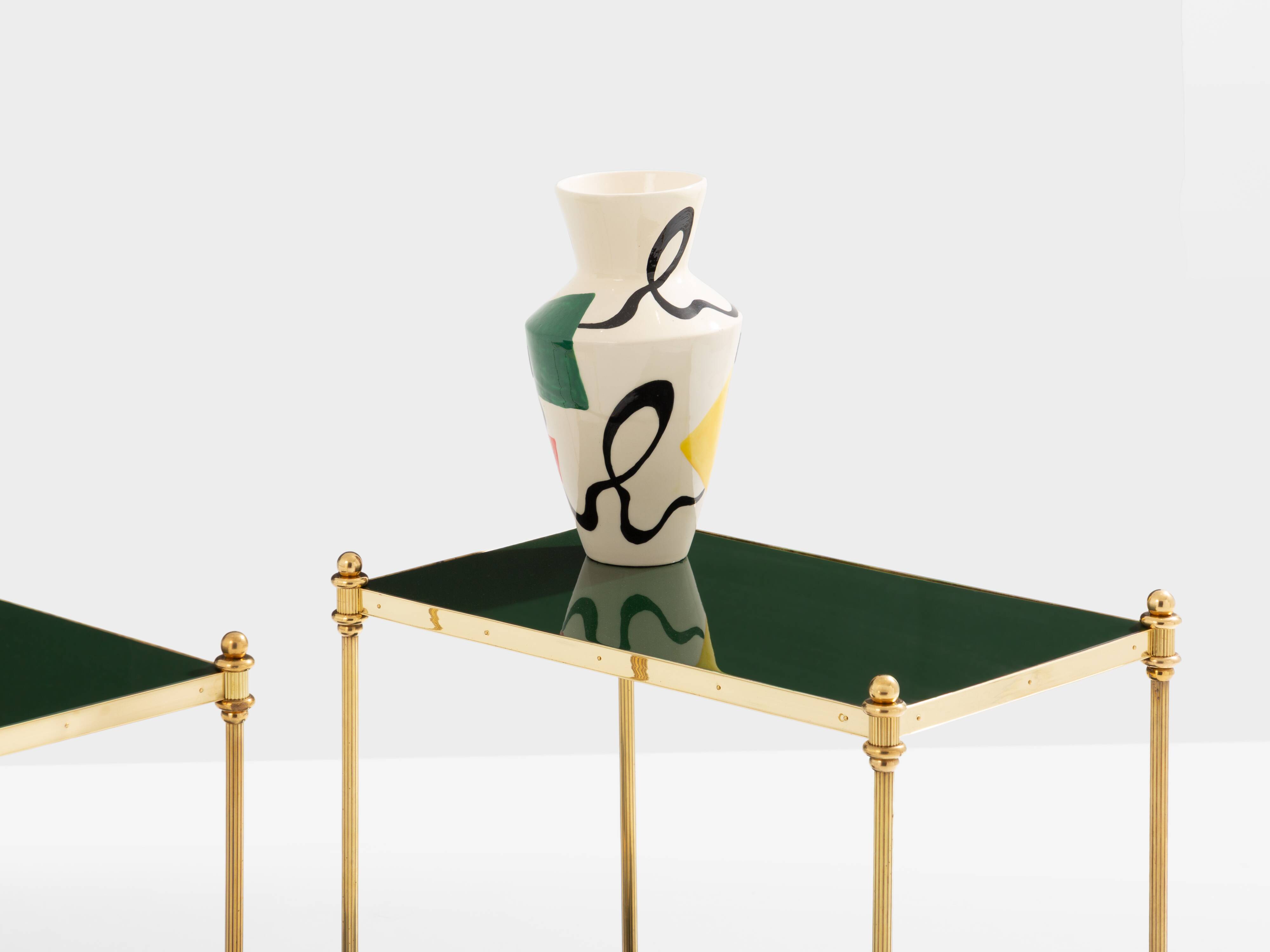 Pair of neoclassical lacquered brass side tables by Maison Jansen, 1970